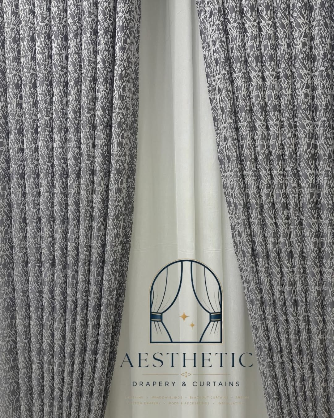 Premium custom curtains installed in a modern living room by Aesthetics Drapery and Curtains