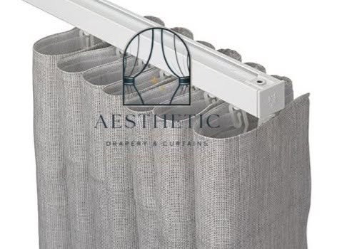 Smart motorized curtains automatically opening inside a modern luxury home installed by Aesthetics Drapery and Curtains Kenya